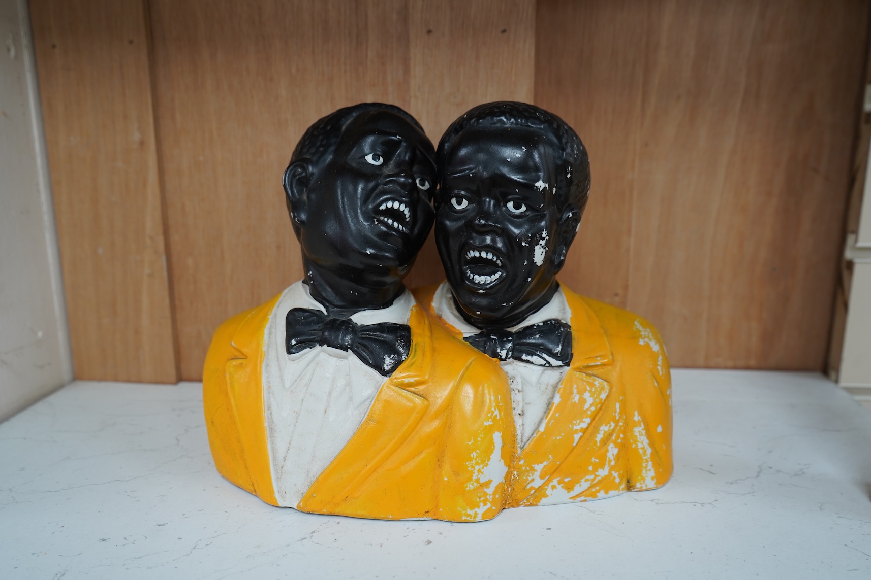 A 20th century Americana ceramic figure group of two jazz singers, 25cm wide